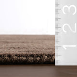 dash albert elevated solids 200neez04b brown hand tufted wool rug