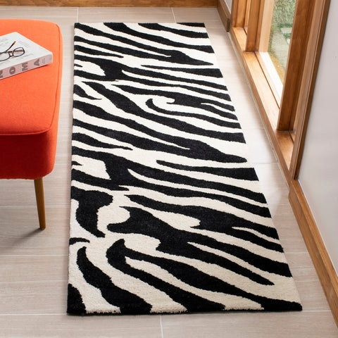 safavieh clearance soho soh717a black rug 1