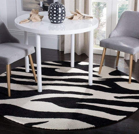 safavieh clearance soho soh717a black rug 1