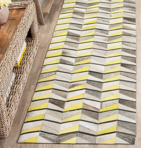 safavieh clearance studio leather stl173a yellow rug
