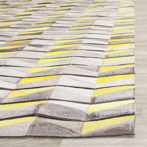 safavieh clearance studio leather stl173a yellow rug