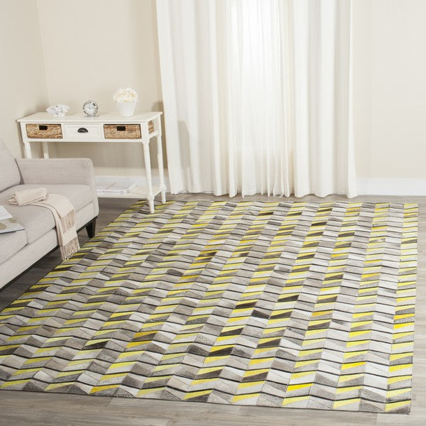 safavieh clearance studio leather stl173a yellow rug