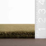 dash albert gania da2533 green loom knotted wool rug