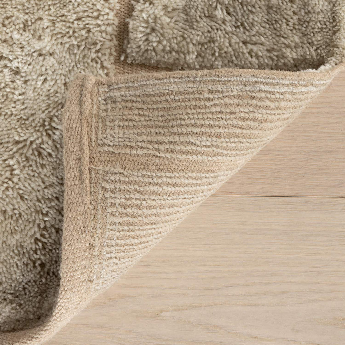 dash albert drela da2525 ivory hand tufted recycled pet rug