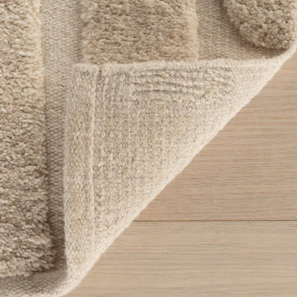 dash albert ais da2530 ivory hand tufted wool rug