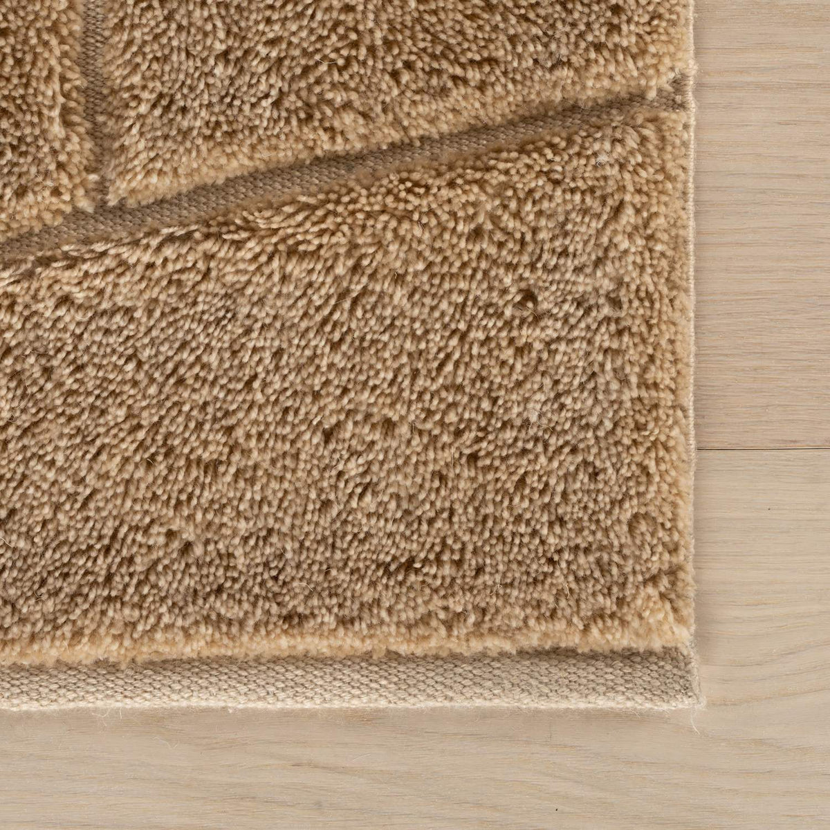 dash albert brela da2526 brown hand tufted recycled pet rug