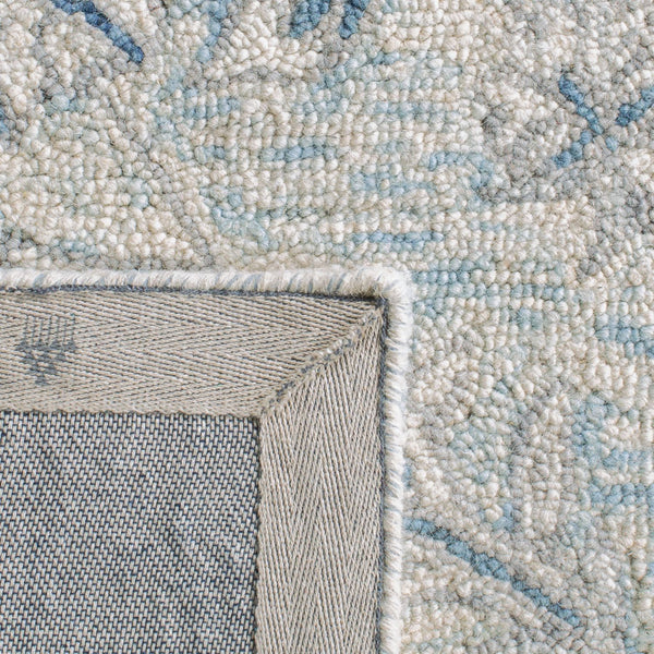 safavieh clearance micro loop mlp506m lightblue ivory rug