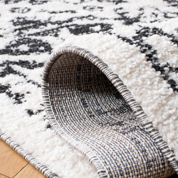 Safavieh Clearance Moroccan Tassel Shag MTS413A Ivory Rug