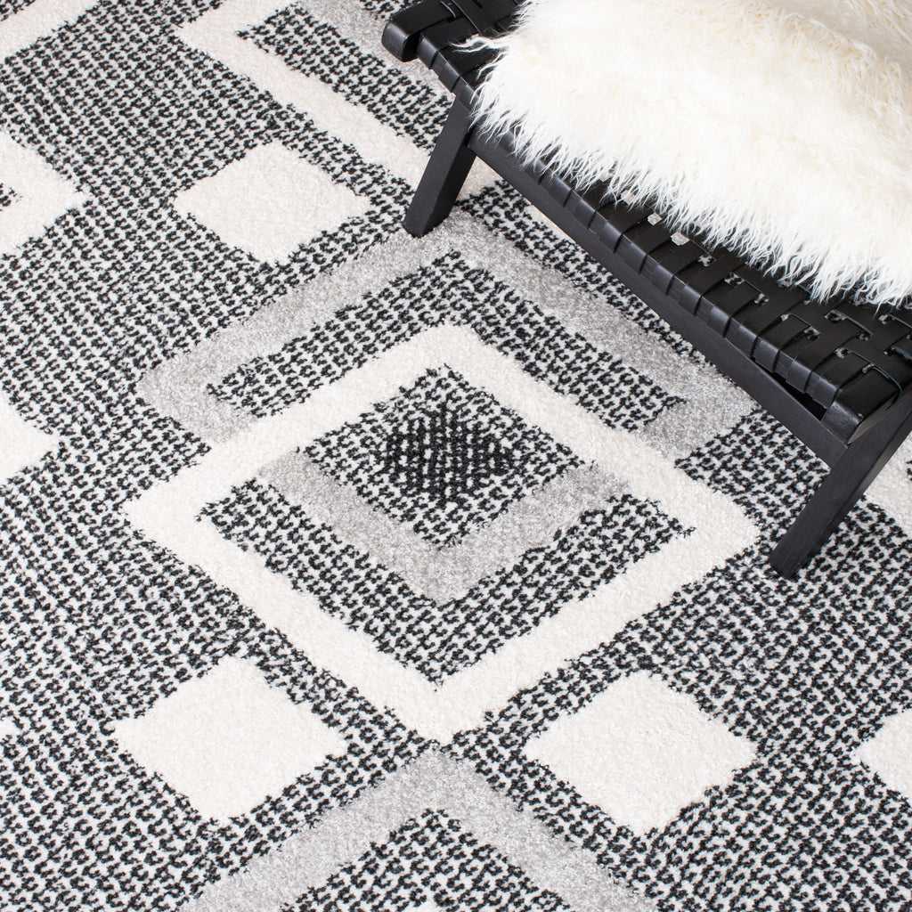 Safavieh Clearance Moroccan Tassel Shag MTS452A Ivory Rug