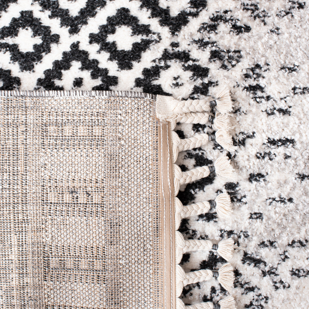 Safavieh Clearance Moroccan Tassel Shag MTS483A Ivory Rug