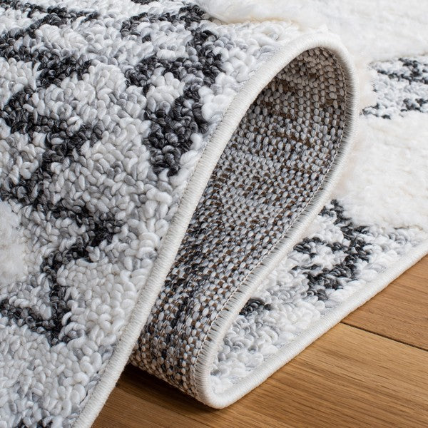 safavieh clearance moroccan tassel shag mts616a ivory rug