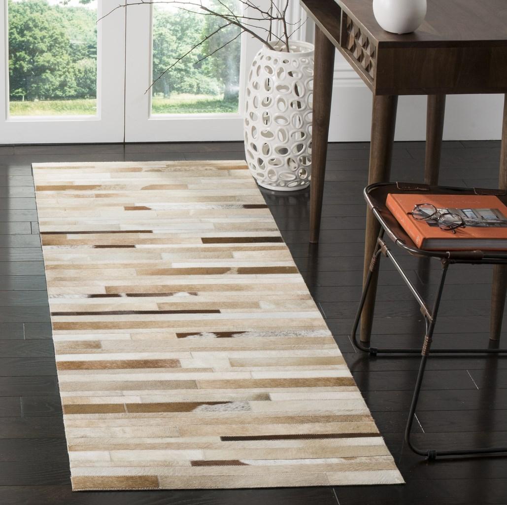 Safavieh Clearance Studio Leather STL218B Camel Rug