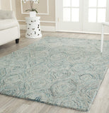 Safavieh Clearance Ikat IKT631A Ivory Rug