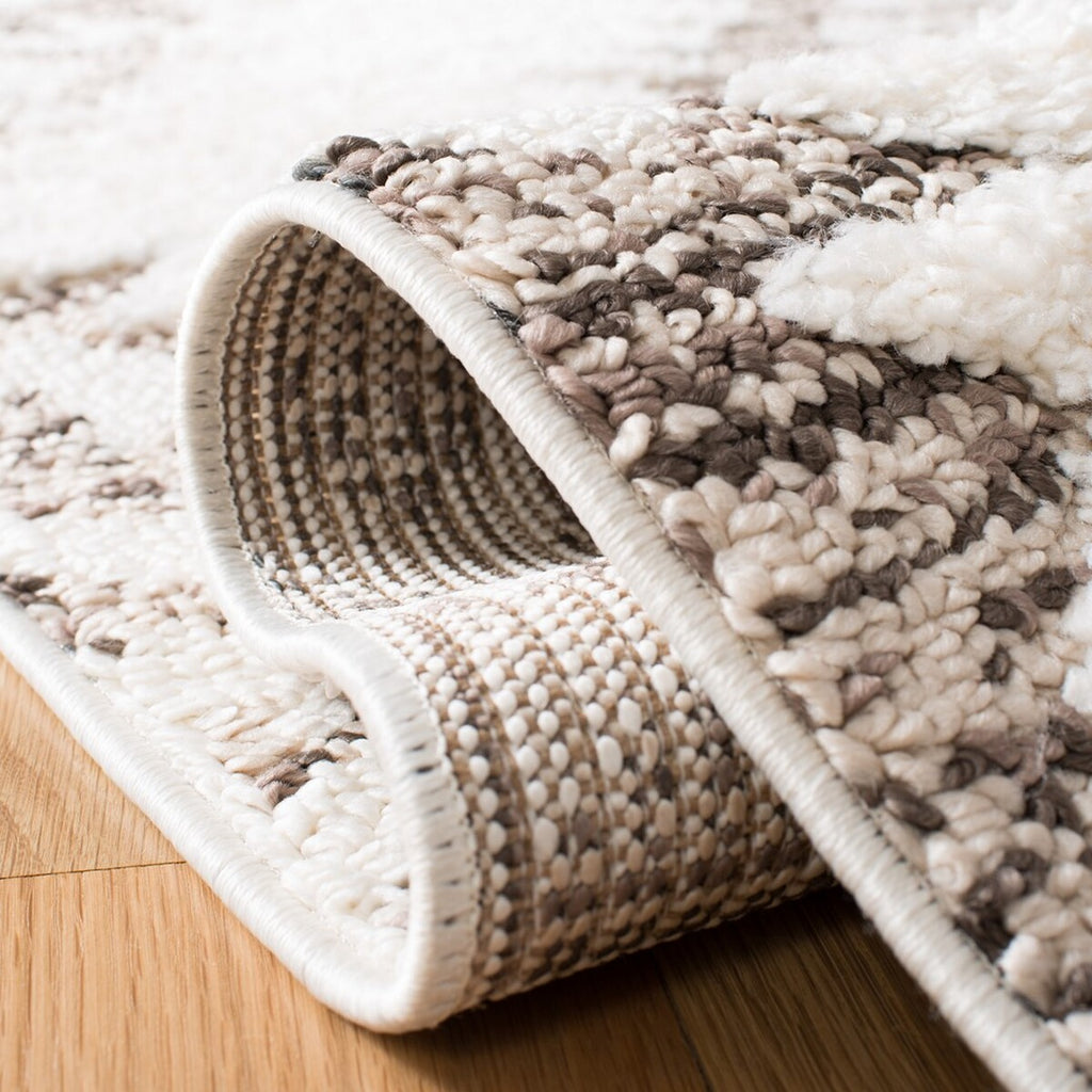 safavieh clearance moroccan tassel shag mts652a ivory rug