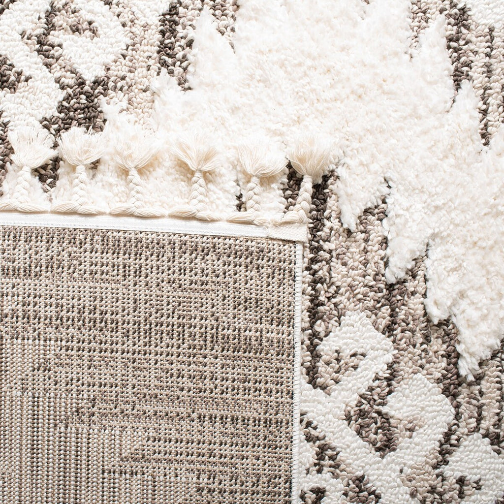 safavieh clearance moroccan tassel shag mts652a ivory rug